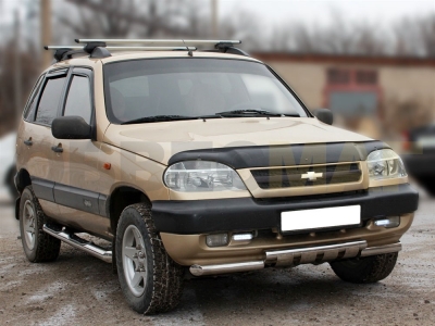 Защита переднего бампера 60 мм с накладками для Chevrolet Niva 2009-2020